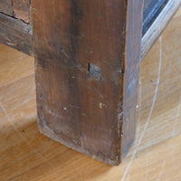 Detail of hand-painted Chinese calligraphy on antique wooden drawers