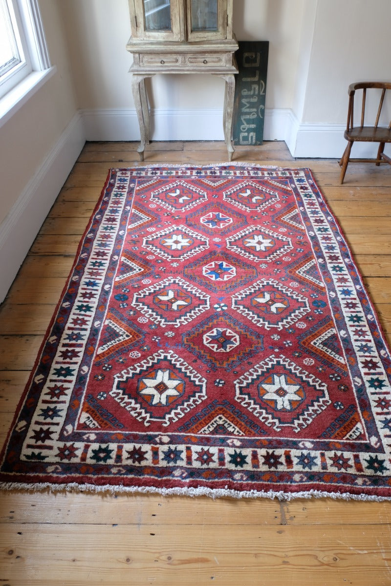 Vintage 1950s Afghan Kilim rug red geometric medallions