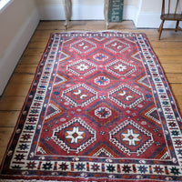 Vintage 1950s Afghan Kilim rug red geometric medallions