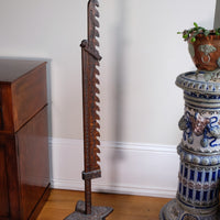 Rare Arts & Crafts carved oak adjustable candle stand with ratchet mechanism