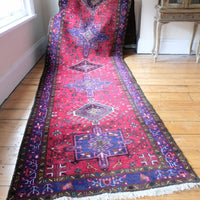 seven medallion persian runner with deep red and electric blue