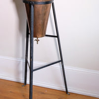 Large Victorian copper conical planter on cast iron stand