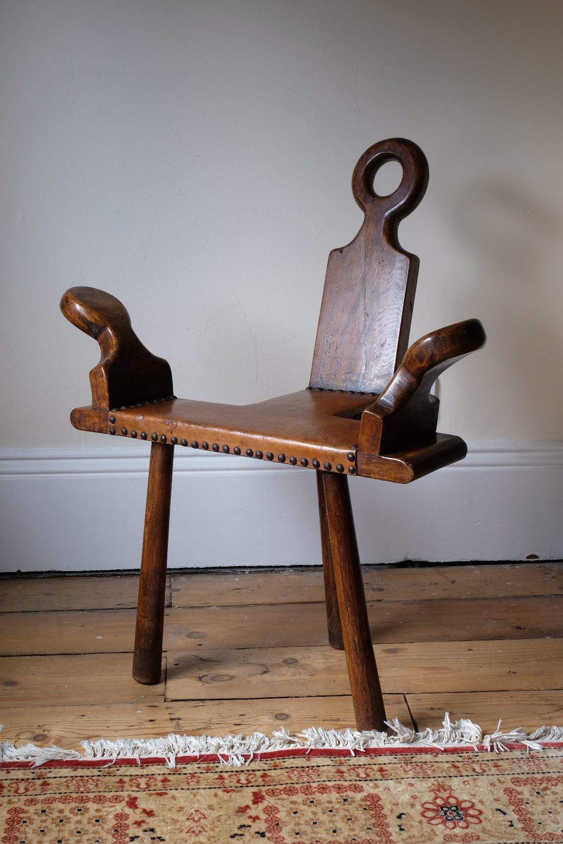 1950s Spanish Brutalist primitive elm leather chair front view