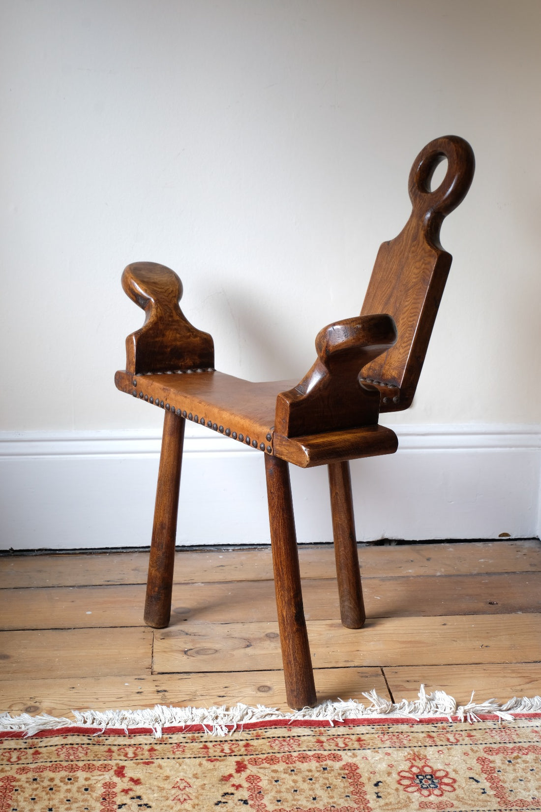 1950s Spanish Brutalist primitive elm leather chair front view