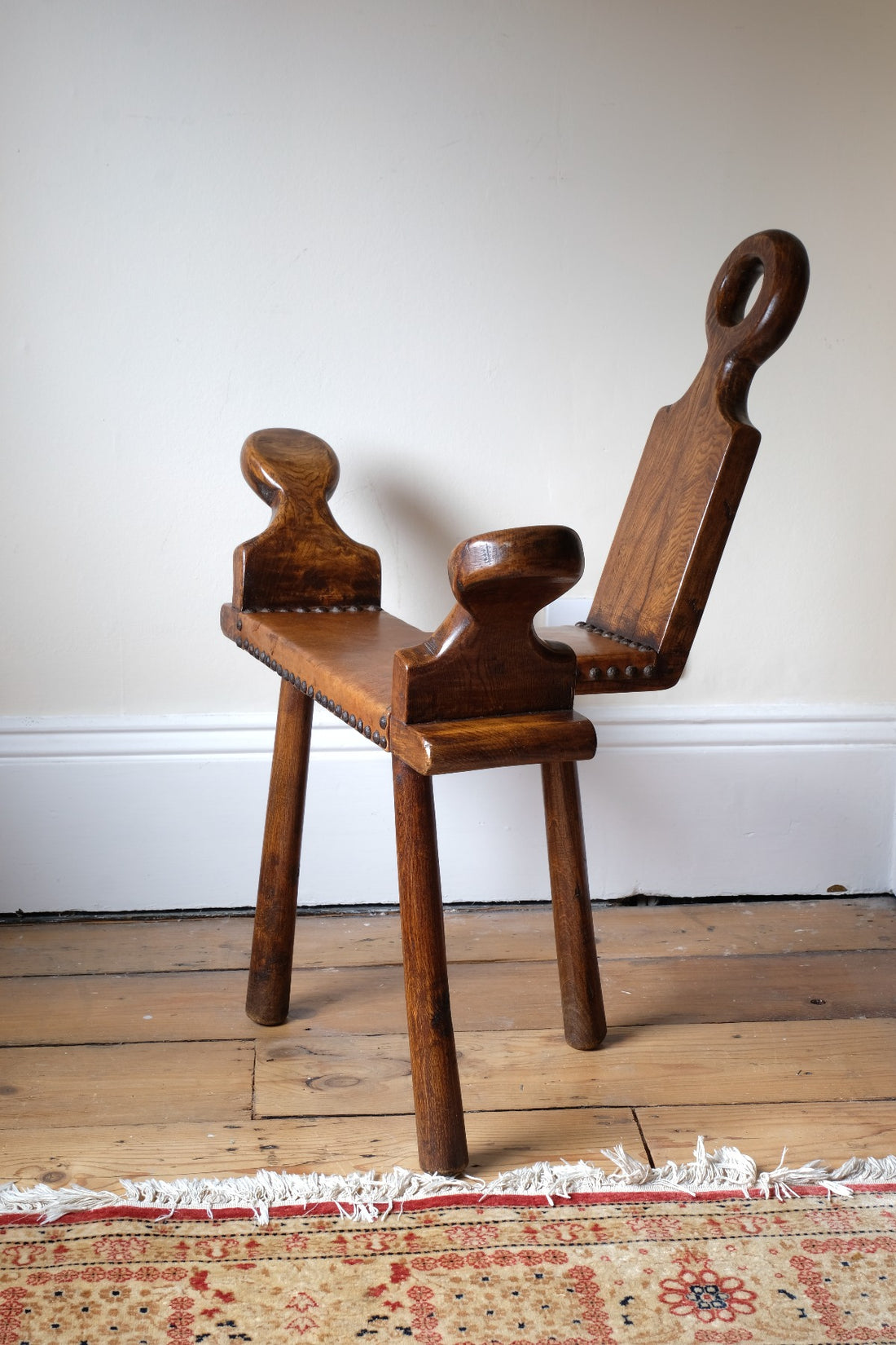 1950s Spanish Brutalist primitive elm leather chair front view