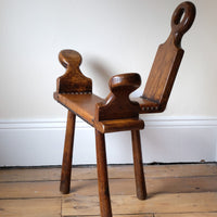 1950s Spanish Brutalist primitive elm leather chair front view