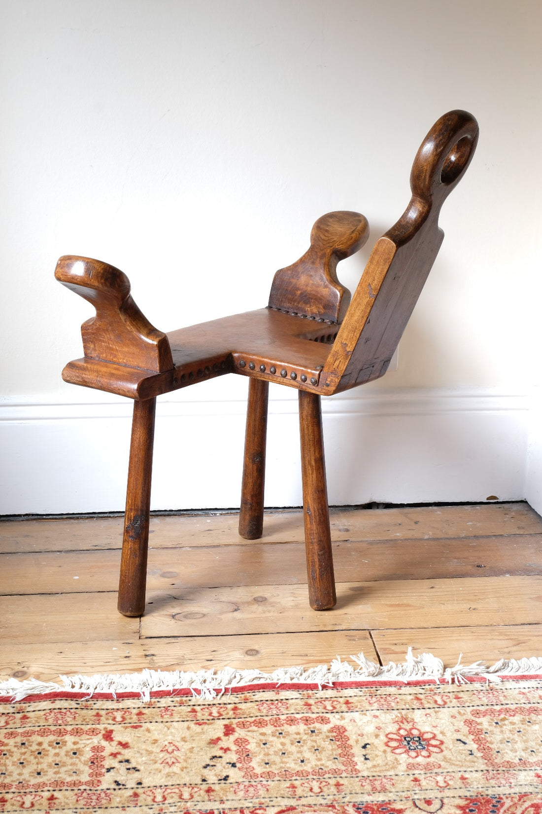 1950s Spanish Brutalist primitive elm leather chair front view