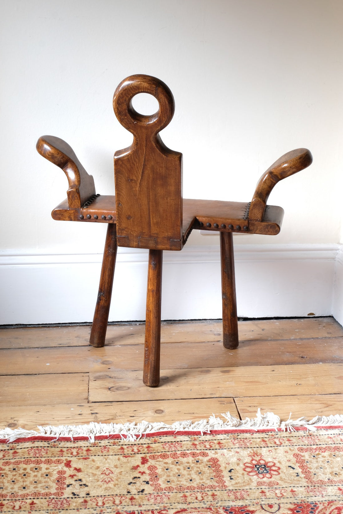 1950s Spanish Brutalist primitive elm leather chair front view