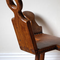 1950s Spanish Brutalist primitive elm leather chair front view