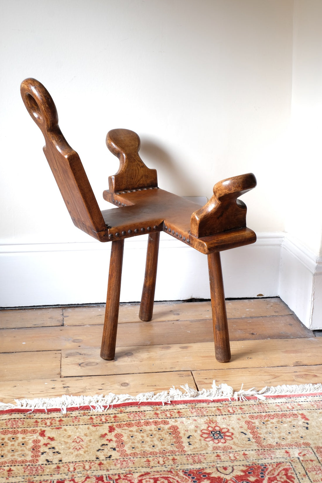 1950s Spanish Brutalist primitive elm leather chair front view