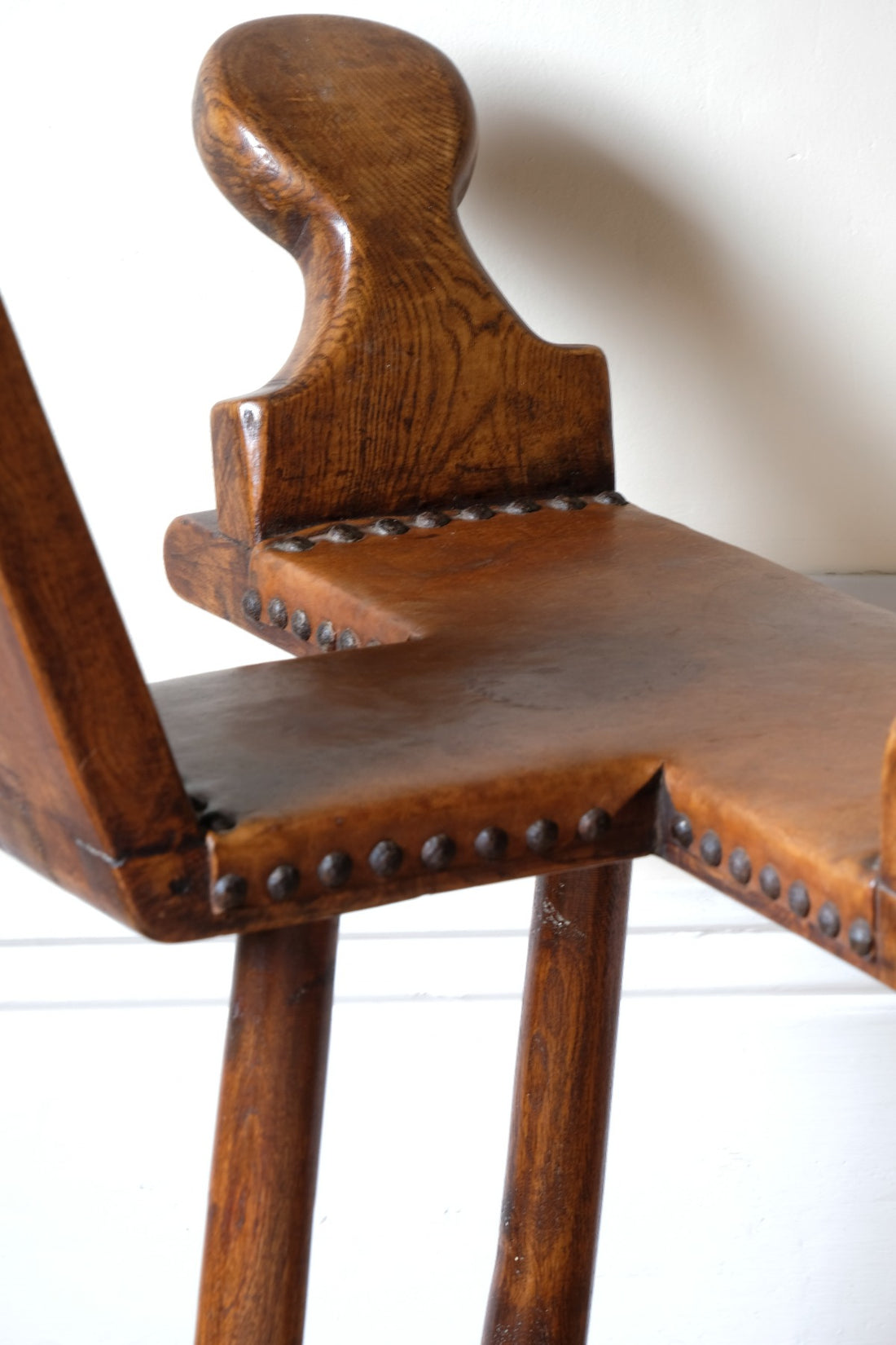 1950s Spanish Brutalist primitive elm leather chair front view