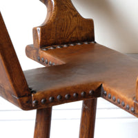 1950s Spanish Brutalist primitive elm leather chair front view