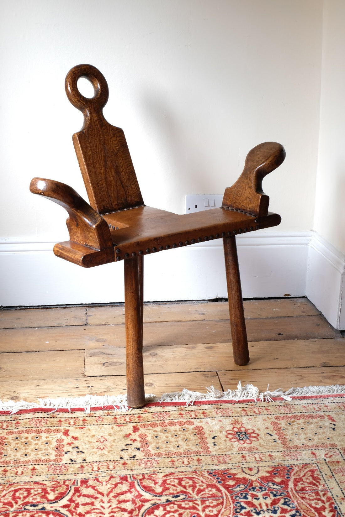 1950s Spanish Brutalist primitive elm leather chair front view
