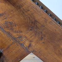Underside showing rough elm grain and tool marks of the 1950s Spanish Brutalist primitive elm leather chair