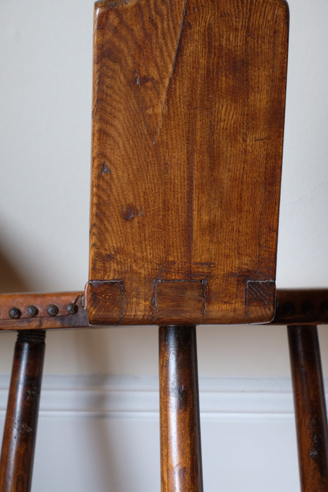 Back of the 1950s Spanish Brutalist primitive elm leather chair front view