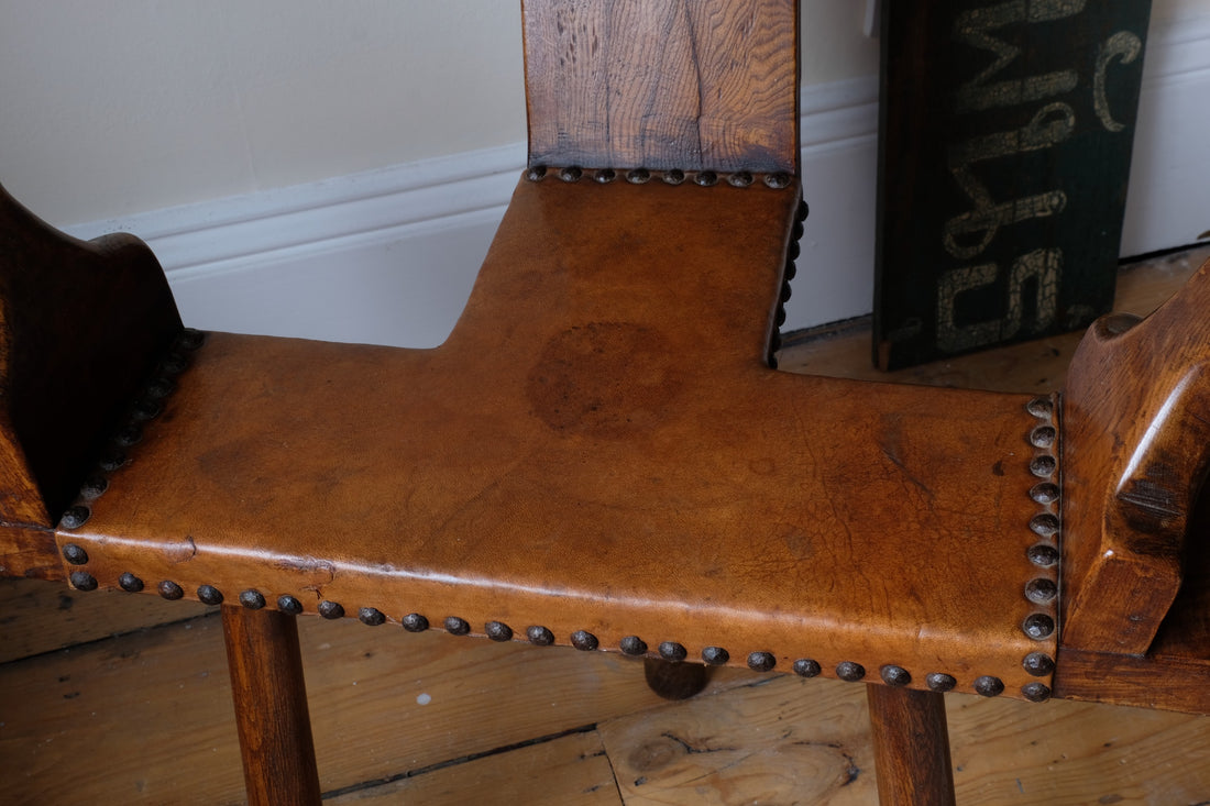 Detail of aged studded leather seat and patina - Spanish Brutalist Elm & Leather Chair