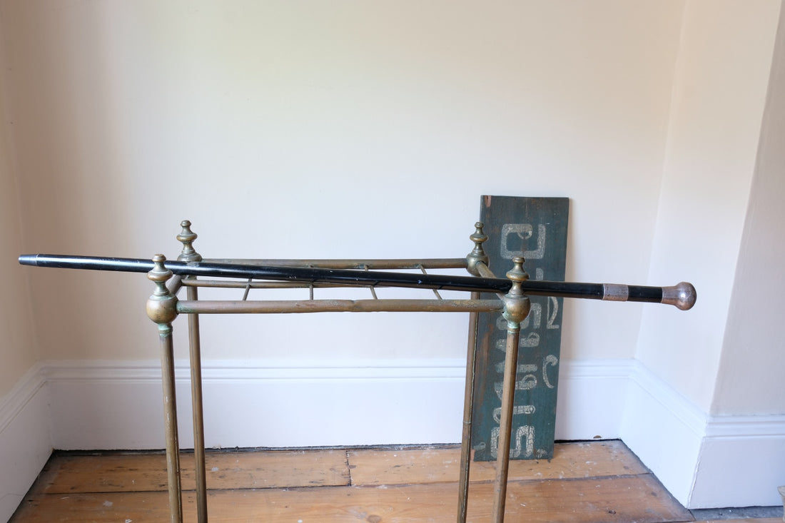 ebonised walking stick with hallmarked silver top and engraved plaque