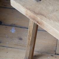 Leg Close up - Primitive handmade wooden armchair with rustic timber finish and blocky carved design