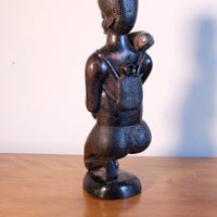 Kenyan ebony wood carving kneeling mother with child bundle