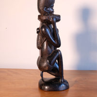 Kenyan ebony wood carving kneeling mother with child bundle