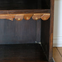 Edwardian carved oak bookcase with leather dust cover fringes