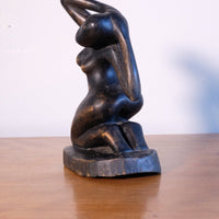 Mid century modernist carved wooden kneeling female nude sculpture with ebonised finish