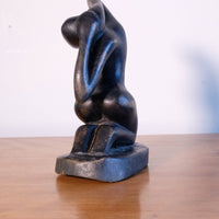Mid century modernist carved wooden kneeling female nude sculpture with ebonised finish