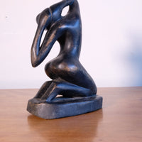 Mid century modernist carved wooden kneeling female nude sculpture with ebonised finish