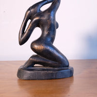 Mid century modernist carved wooden kneeling female nude sculpture with ebonised finish