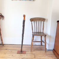 Antique Irish blackthorn walking stick with natural bark shaft and boxwood handle