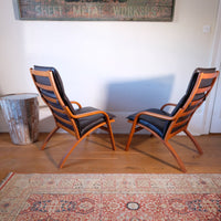rear view or back view - Pair of 1970s Danish Stouby bentwood leather lounge chairs with sculptural oak frames