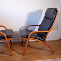 Pair of 1970s Danish Stouby bentwood leather lounge chairs with sculptural oak frame