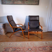 Pair of 1970s Danish Stouby bentwood leather lounge chairs with sculptural oak frame