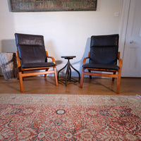 Pair of 1970s Danish Stouby bentwood leather lounge chairs with sculptural oak frame