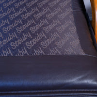Branded cushion liner of a Cushion support of a Pair of 1970s Danish Stouby bentwood leather lounge chairs with sculptural oak frame