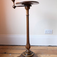 English Regency solid walnut candlestand table with burr walnut top and tulip-shaped sconce