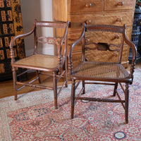 Pair of Regency mahogany armchairs with brass inlay and cane seats, circa 1810