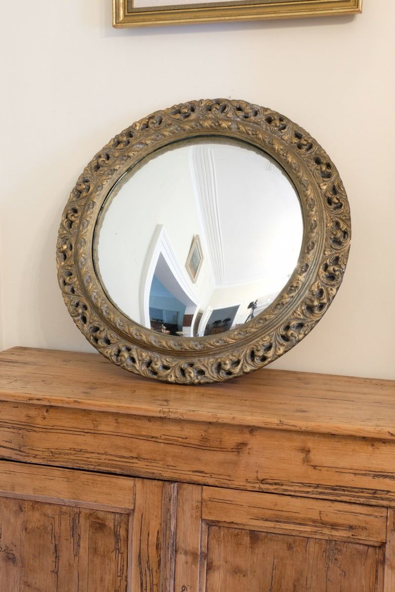 19th Century Round Convex Giltwood Mirror with Pierced Foliate Frame