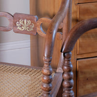 Close p of brass inlay on the Pair of Regency mahogany armchairs with brass inlay and cane seats, circa 1810