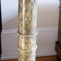 Close up of an Antique Verd Antique green brecciated marble pedestal column Victorian display stand