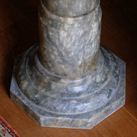 Base close up of an Antique Verd Antique green brecciated marble pedestal column Victorian display stand