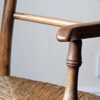 Turned arm supports on the Philip Clissett Arts & Crafts Ash Rush Seat Spindle Back Armchair Circa 1890Philip Clissett Arts & Crafts Ash Rush Seat Spindle Back Armchair Circa 1890