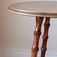 Close up of the faux bamboo detailed legs - Victorian mahogany cricket table with faux bamboo legs and two-tone finish