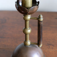 Arts & Crafts copper and brass candlestick pair with patina