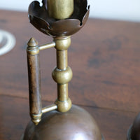 Arts & Crafts copper and brass candlestick pair with patina