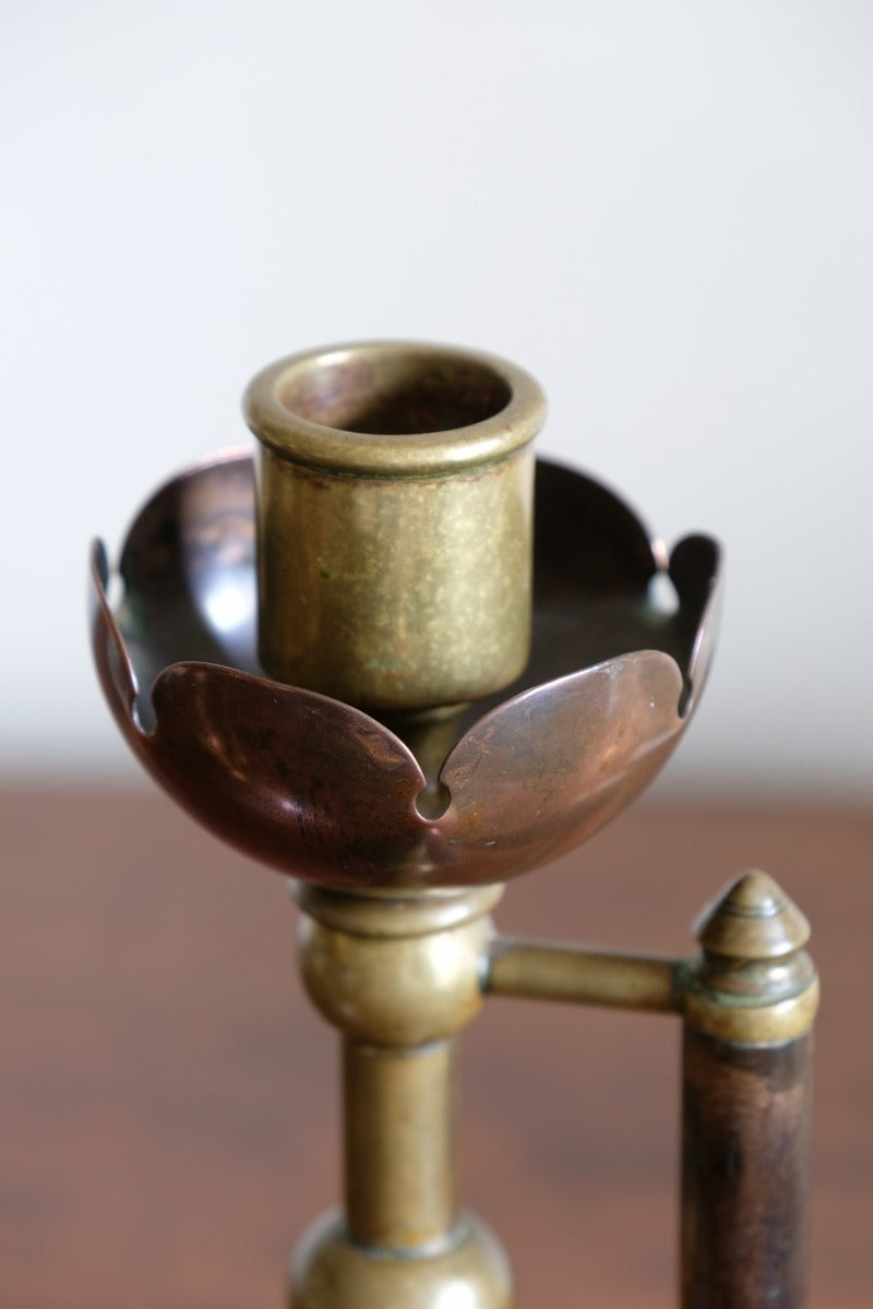 Arts & Crafts copper and brass candlestick pair with patina