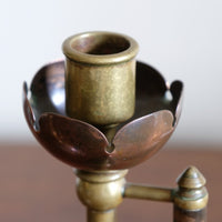 Arts & Crafts copper and brass candlestick pair with patina
