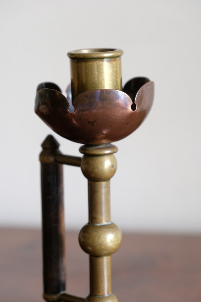 Arts & Crafts copper and brass candlestick pair with patina