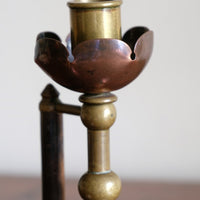 Arts & Crafts copper and brass candlestick pair with patina