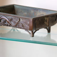 Modern glass hall table with sculptural metal V-shaped base in Leon Rosen style